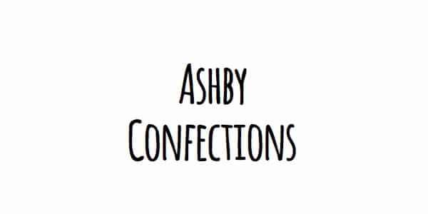 Written in dark black capital letters reads, "Ashby Confections" in front of a solid white background